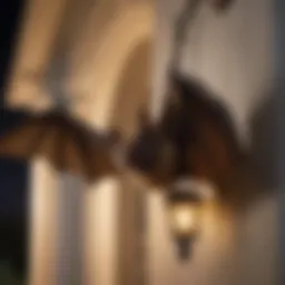 A peaceful nighttime setting showing a bat flying near a porch light