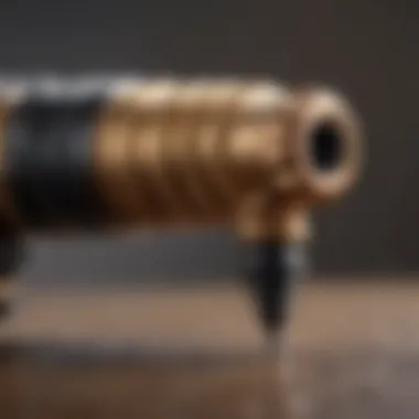 Detailed view of the termite gun's nozzle and spray mechanism